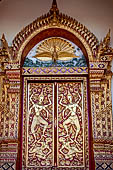 Chiang Mai - Wat Phra That Doi Suthep. Decorated door on the back wall of the temple. 